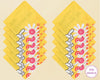 Stack of yellow hankies with floral design on a beige background