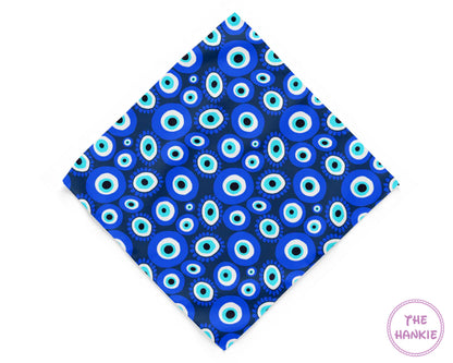 Blue patterned hankie with white and light blue circles on a white background, branded 'The Hankie'.