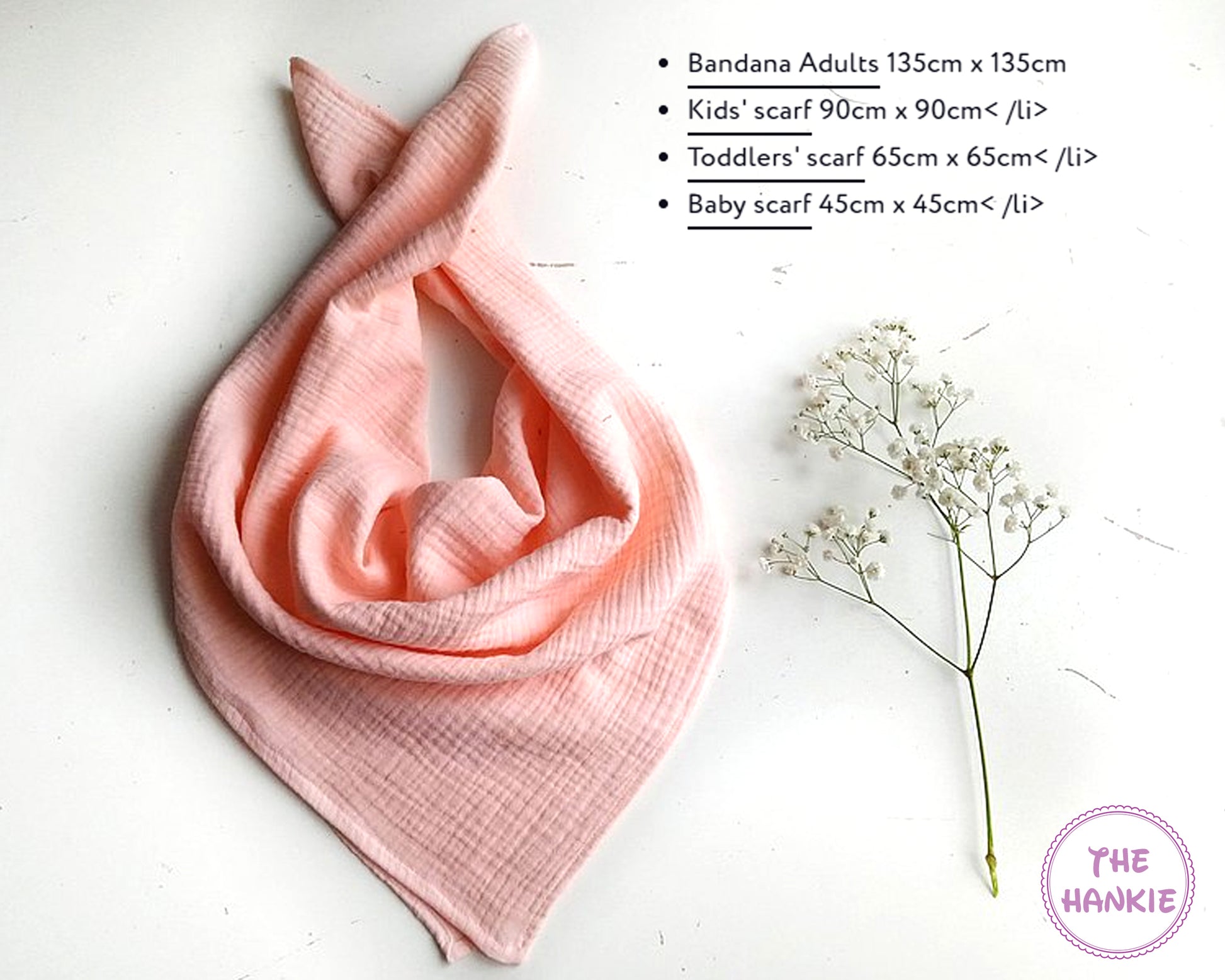 Pink scarf with dimensions listed on a white background