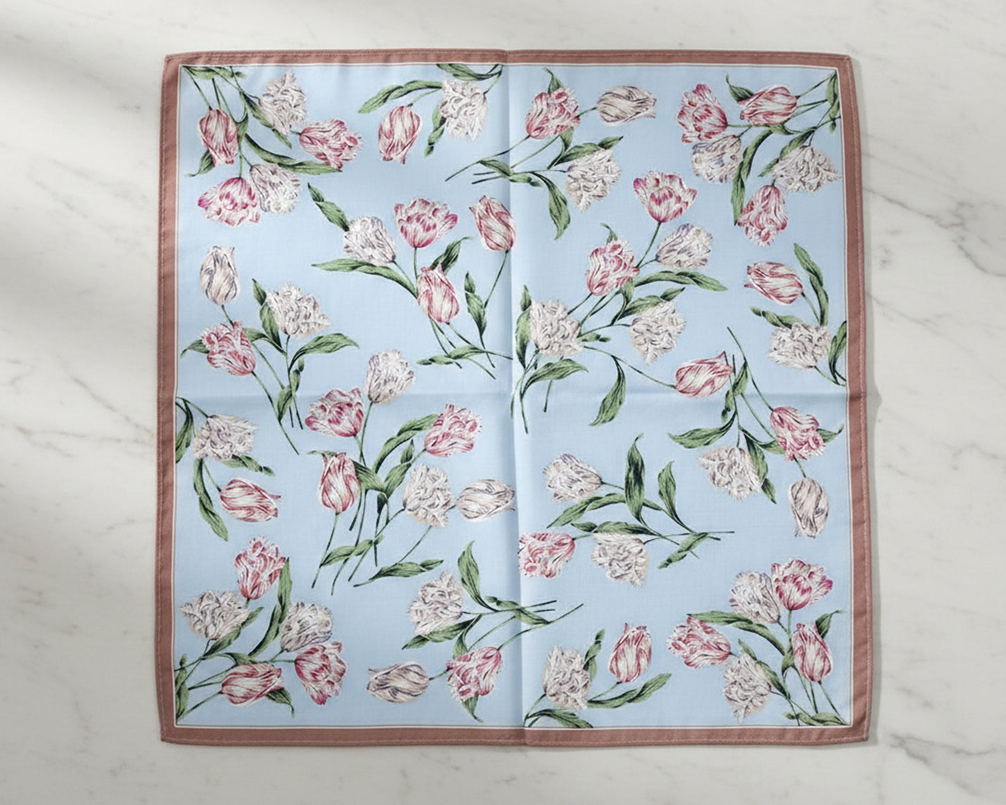 Floral patterned fabric on a marble surface