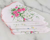 Set of floral handkerchiefs on a marble surface