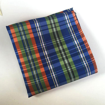 Plaid fabric with blue, green, and orange pattern on a white background