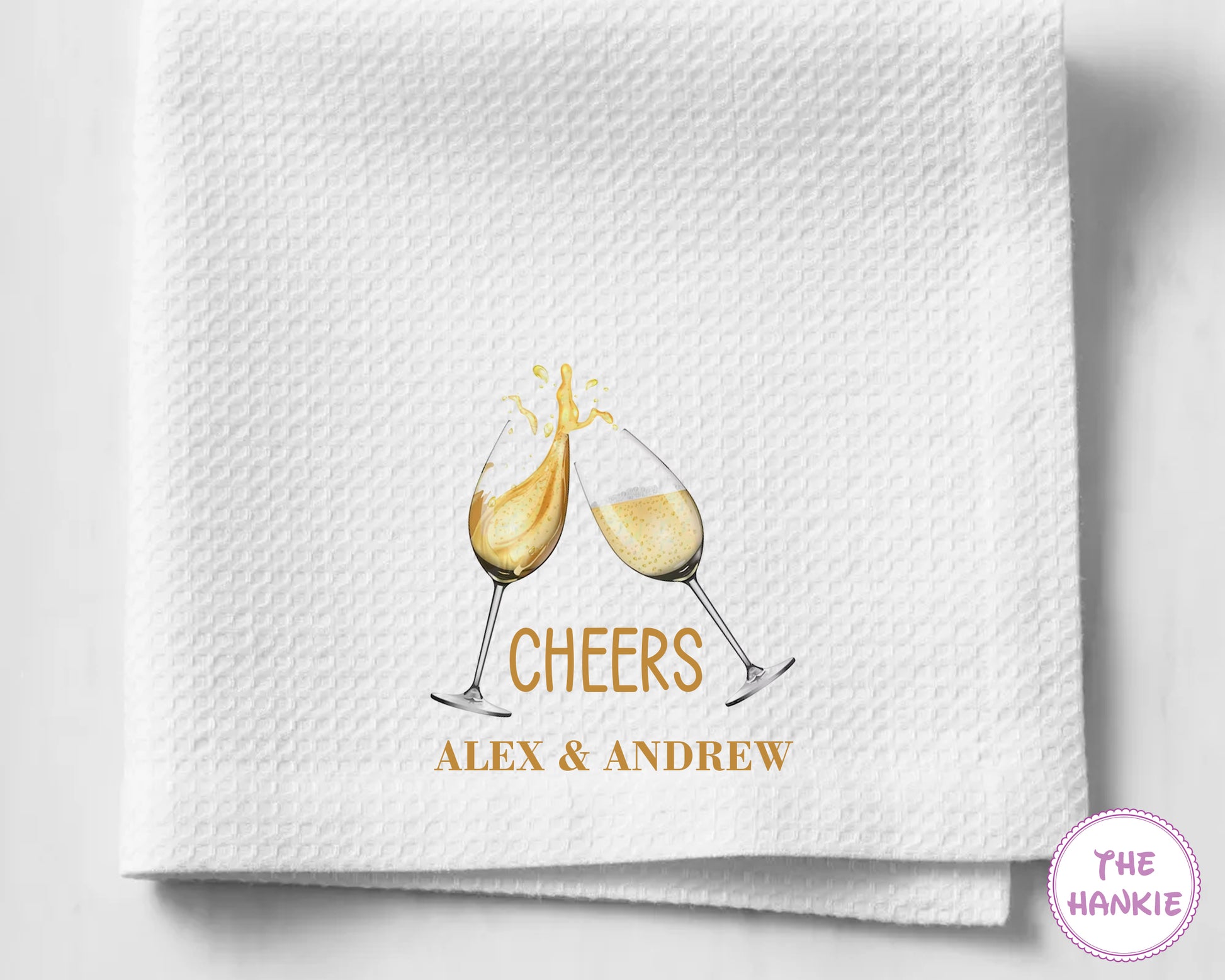 White towel with 'Cheers' design and personalized text on a light gray background