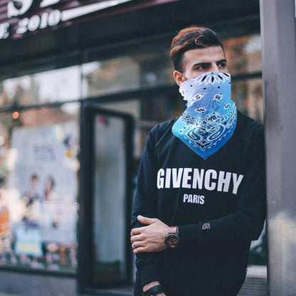 Customize Your Own Multicolor Scarf- Neck Tie Scarf Person wearing a Givenchy Paris sweatshirt with a blue bandana, standing in an urban setting.