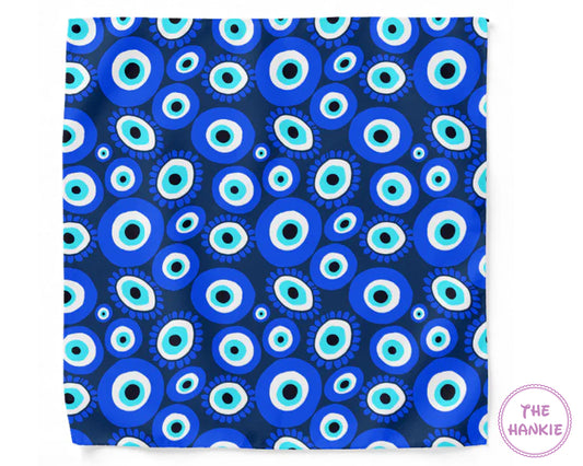 Blue and white circular patterned fabric with 'The Hankie' brand logo.