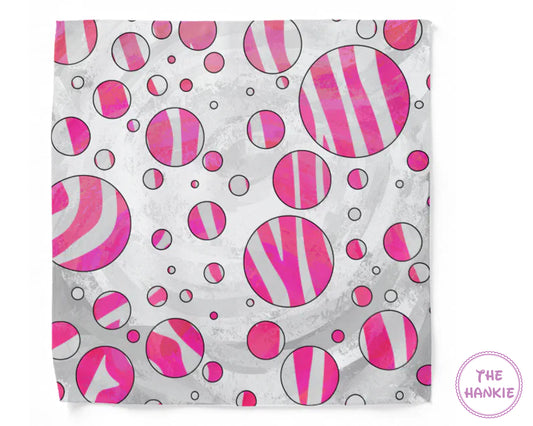 Pink and white striped circles on a gray background with 'The Hankie' brand logo.