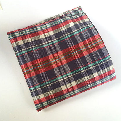 Plaid fabric with red, blue, and beige pattern on a white background Vintage red handkerchief  