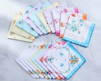 Set of floral handkerchiefs in various colors on a light background