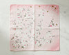 Floral patterned hanky light pink color background white marble 
