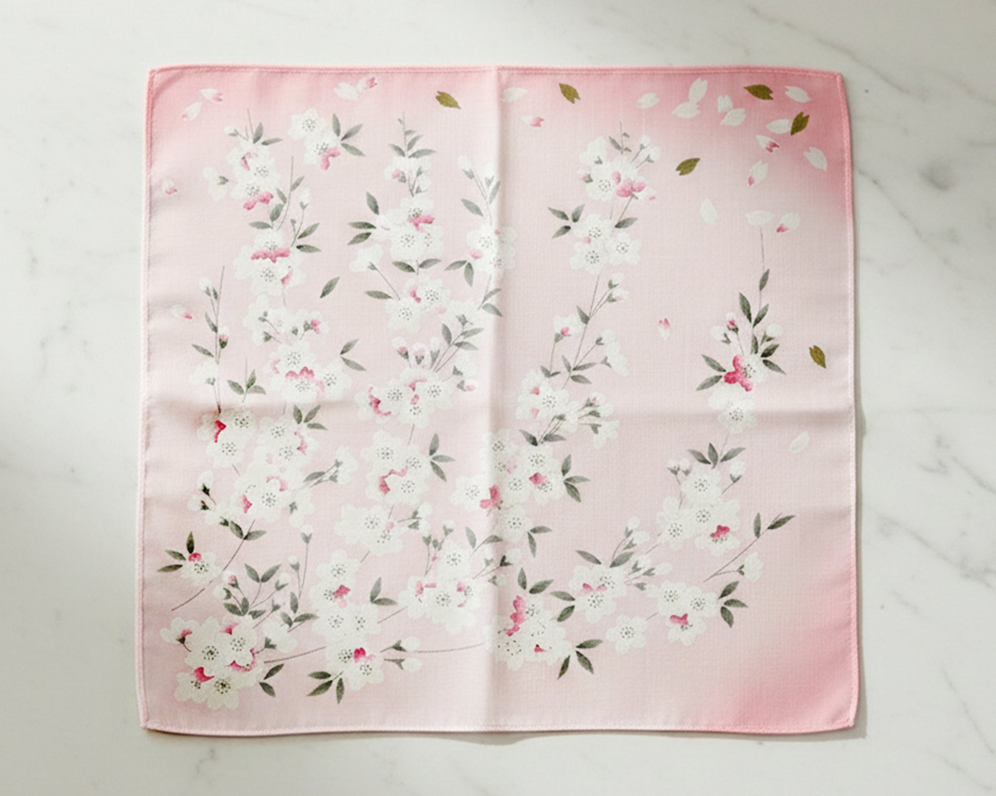 Floral patterned hanky light pink color background white marble 