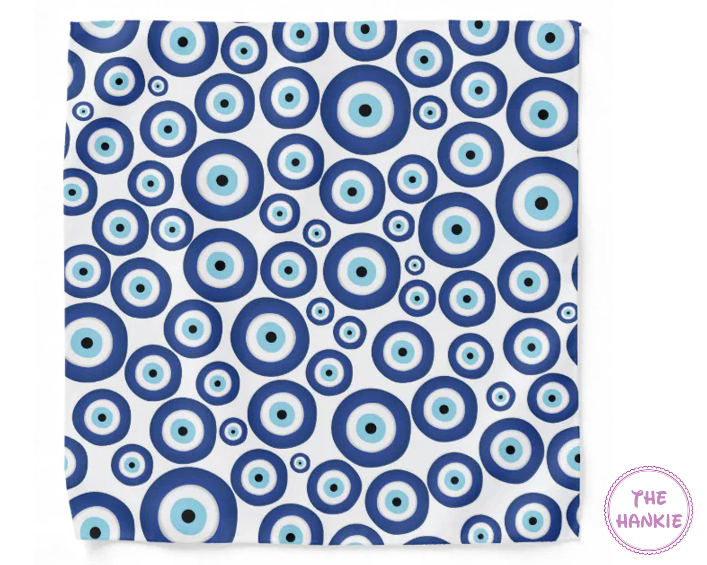 Patterned fabric with blue and light blue circles on a white background, branded 'The Hankie'.