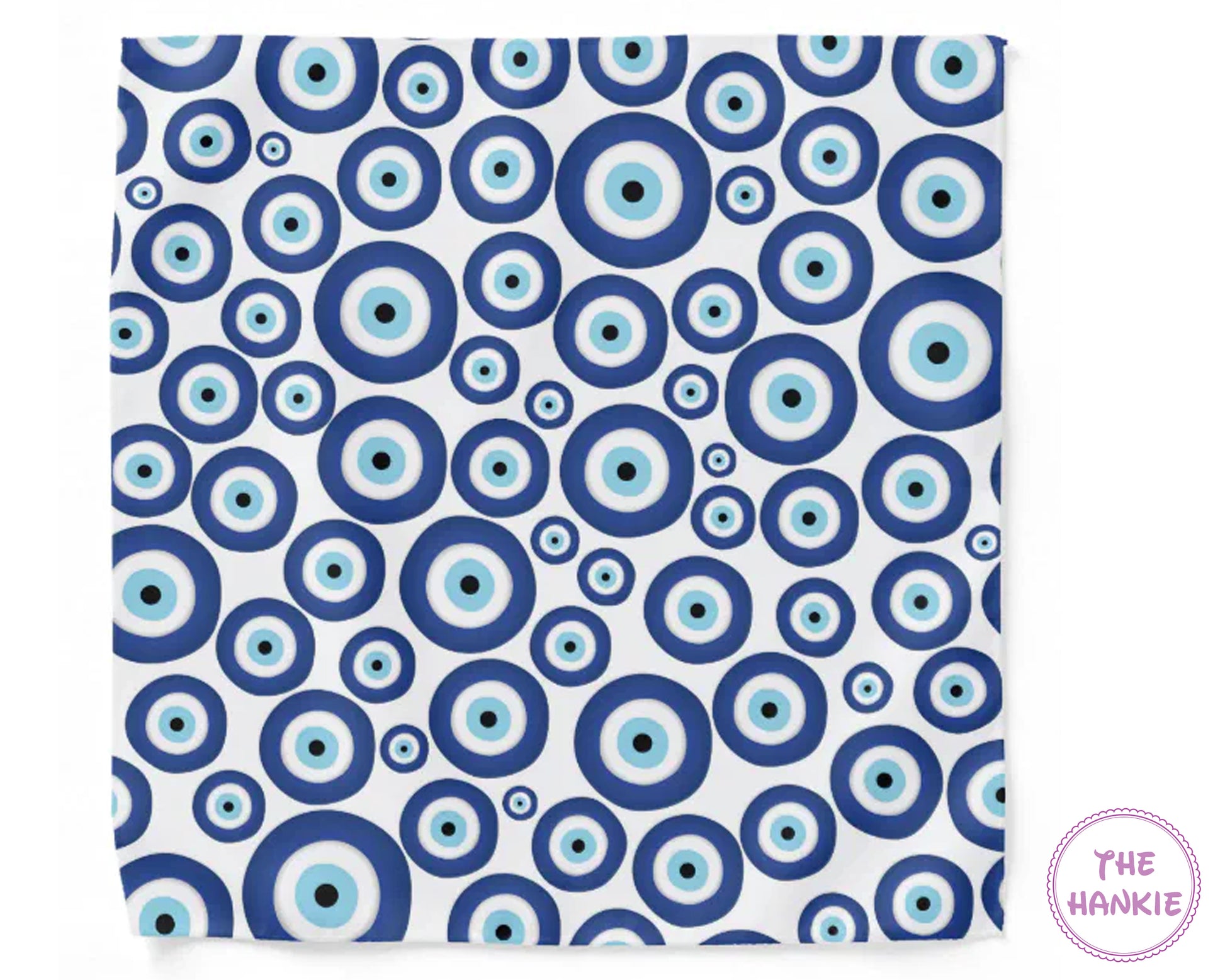 Patterned fabric with blue and light blue circles on a white background, branded 'The Hankie'.