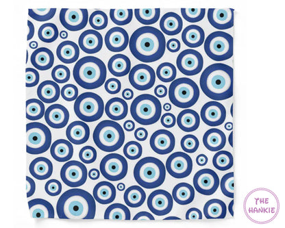 Patterned fabric with blue and light blue circles on a white background, branded 'The Hankie'.