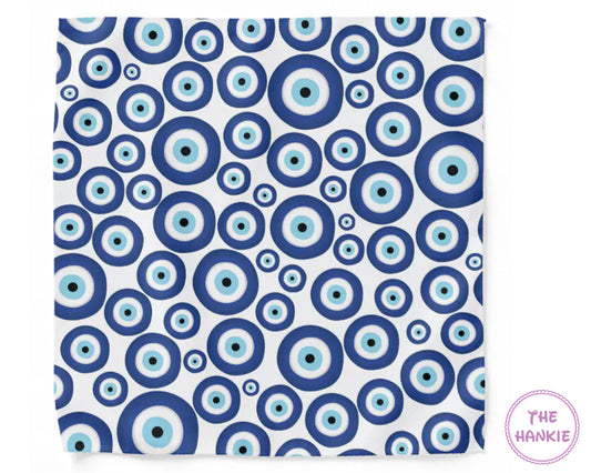 Patterned fabric with blue and light blue circles on a white background, branded 'The Hankie'.