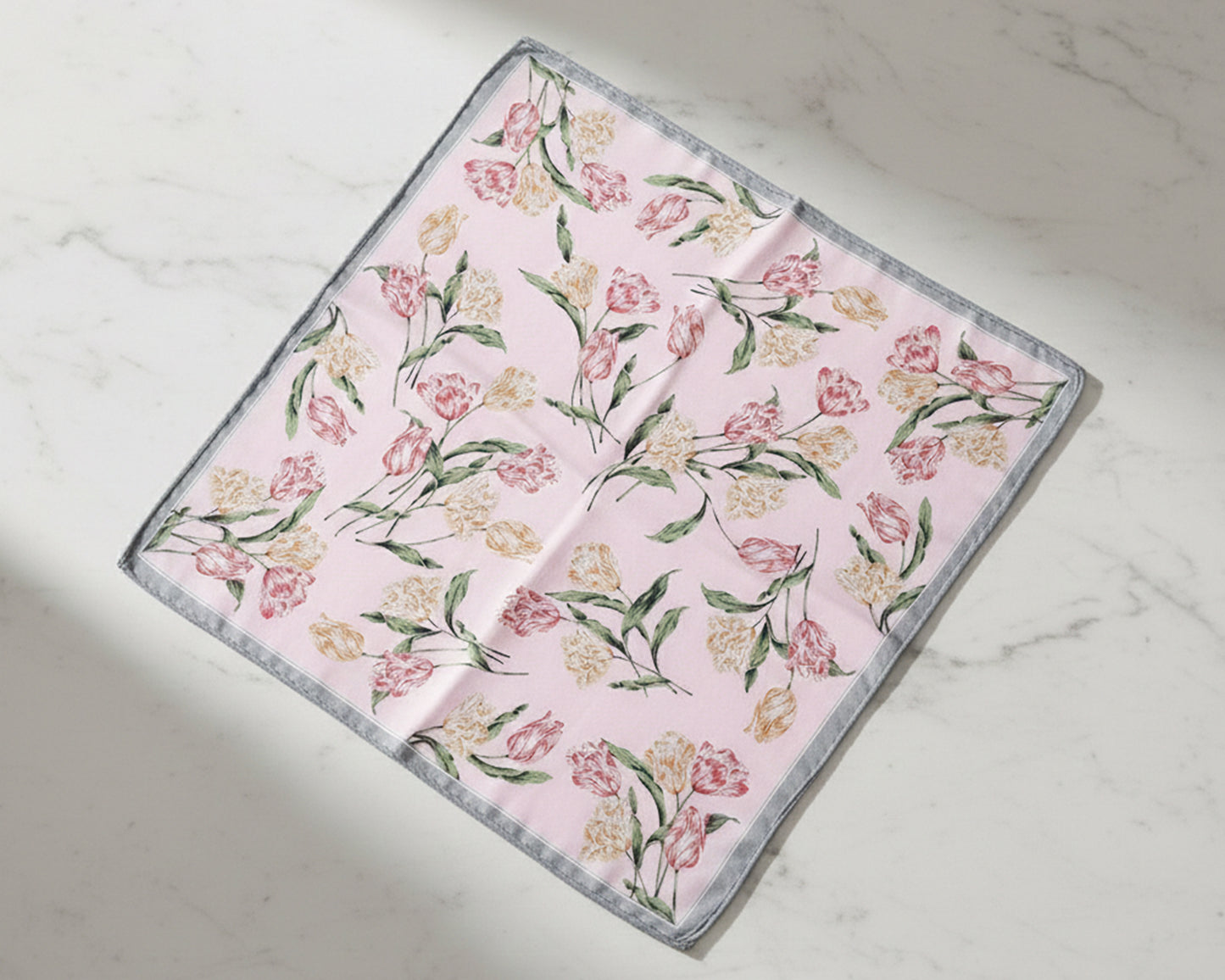 Floral patterned fabric on a marble surface