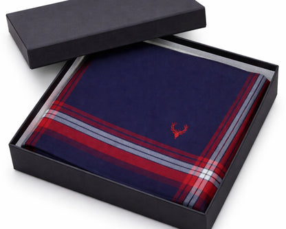 Navy blue and red plaid pocket square in a black box on a white background