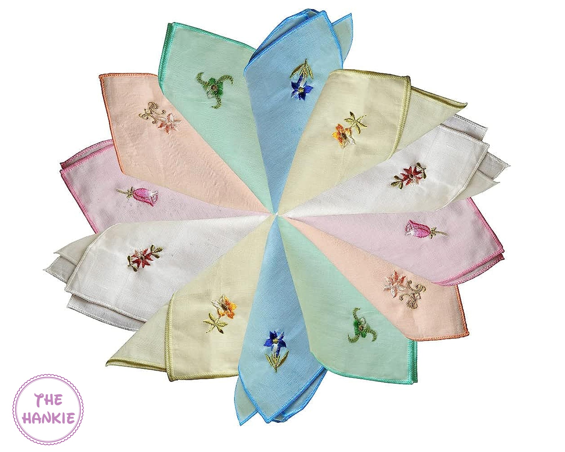 Set of embroidered handkerchiefs in pastel colors arranged in a circular pattern.