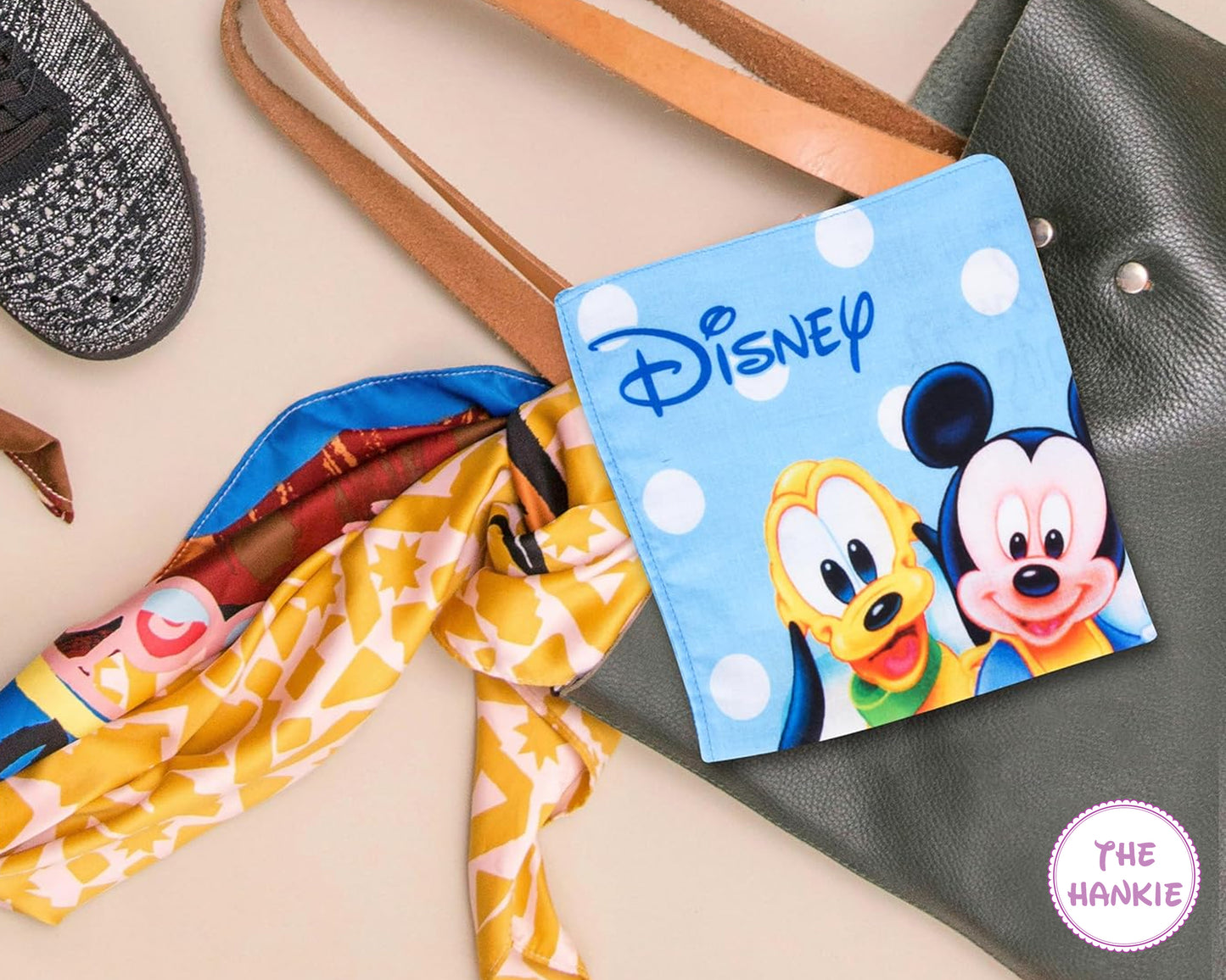Disney-themed hankie with Mickey and Donald Duck on a beige surface