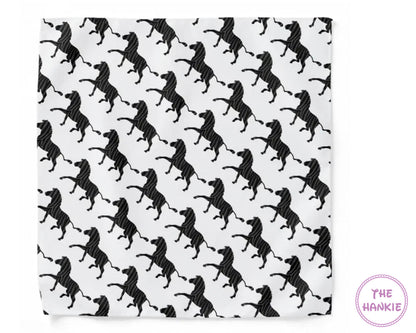 White hankie with black dog pattern and 'The Hankie' branding.