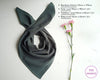 Gray bandana with a floral arrangement on a white background, featuring size information.