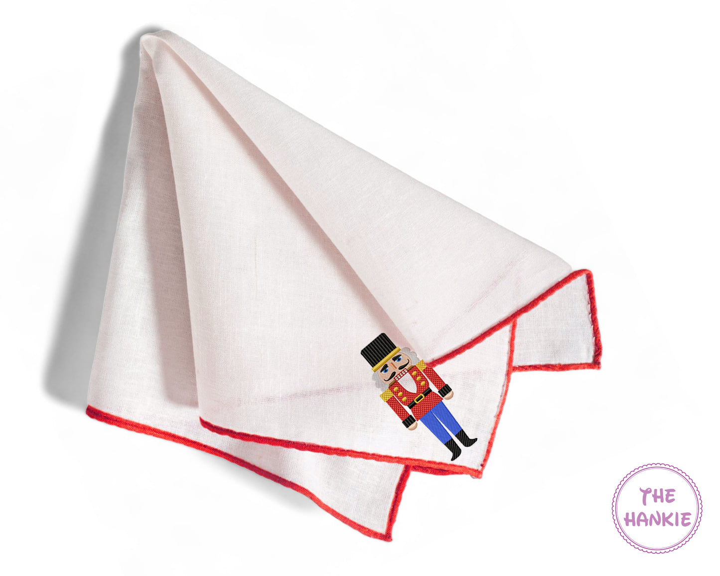 Four Christmas-themed hankies with different designs on a white background, labeled 'Design 1' to 'Design 4'.