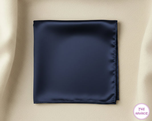 Navy blue satin hankie on a beige background with 'The Hankie' brand logo.