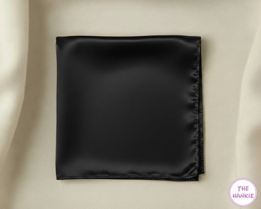 Black satin hankie on a beige background with 'The Hankie' brand logo.