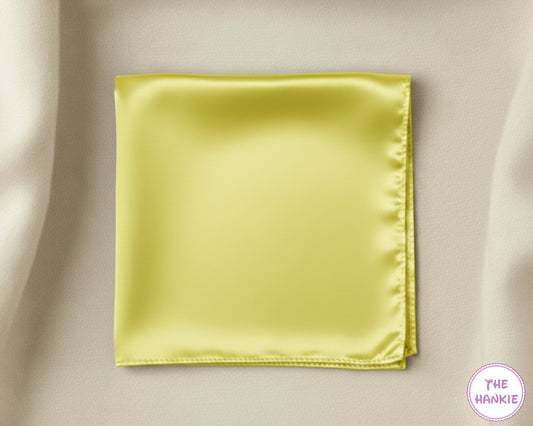 Yellow satin hankie on a beige background with 'The Hankie' brand logo.