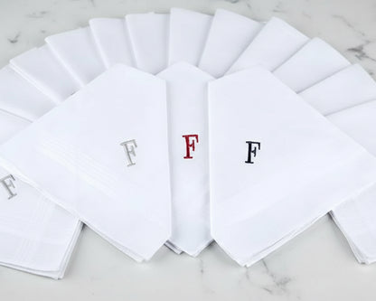 Set of white handkerchiefs with embroidered letters 