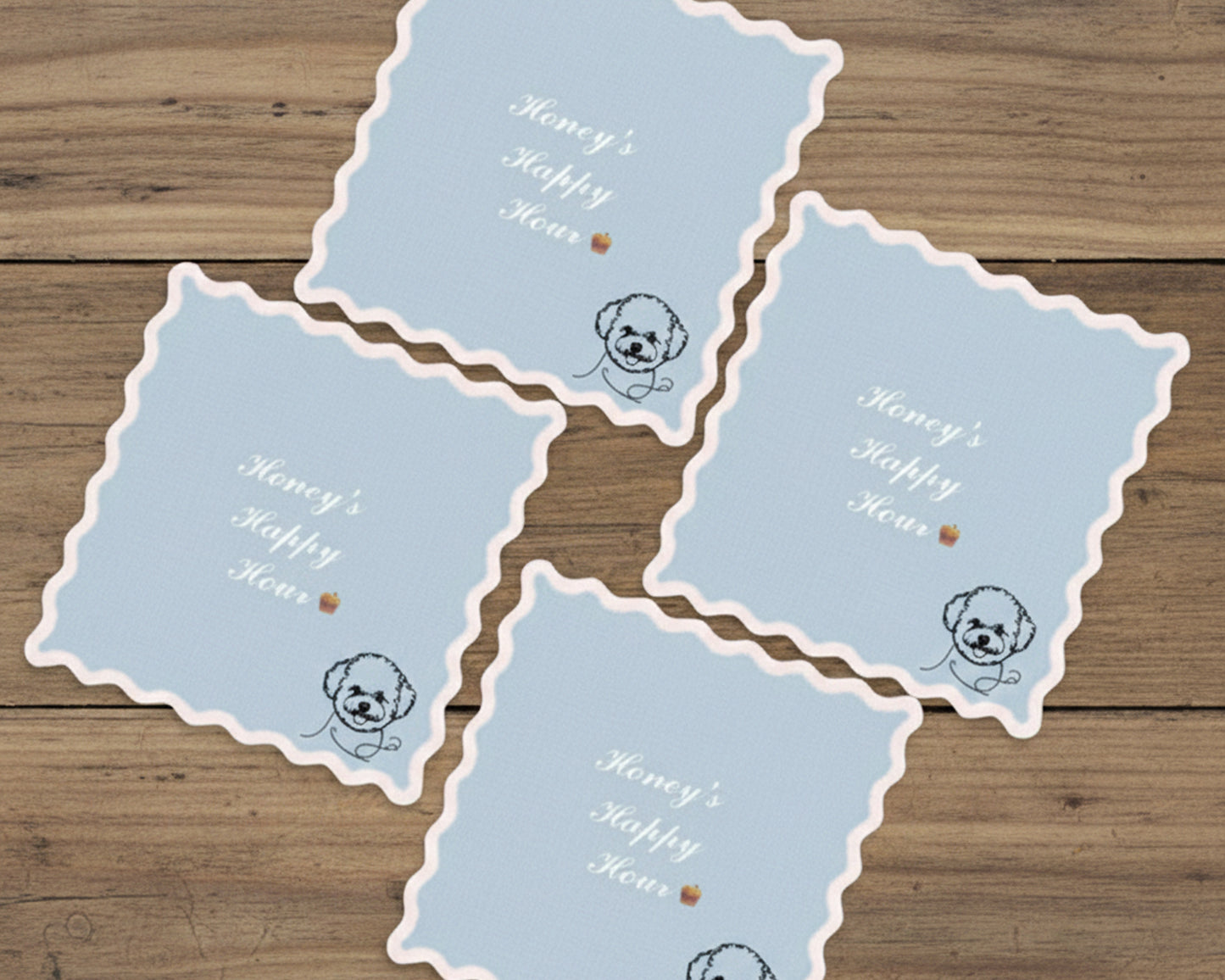 Set of blue cards with dog illustrations and text on a wooden surface