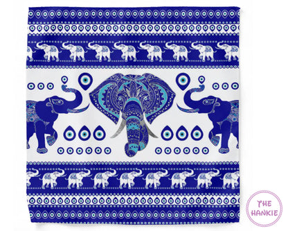 Patterned fabric with blue elephants and white background