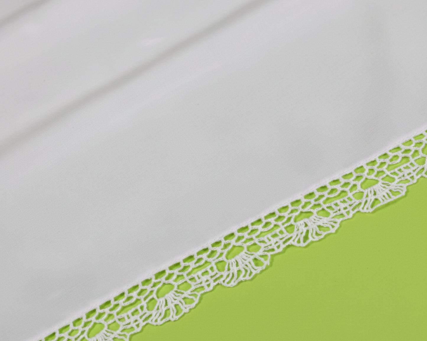 Full square view of a white cotton bridal handkerchief featuring a wide floral lace edge.