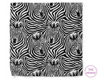 Pattern of zebras with 'The Hankie' logo in the corner