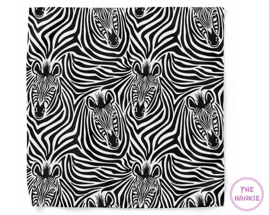 Pattern of zebras with 'The Hankie' logo in the corner