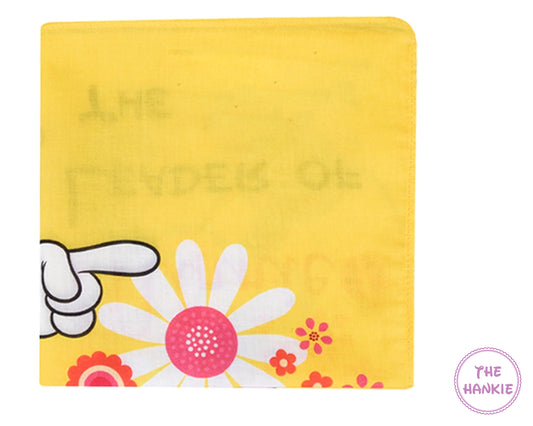 Yellow hankie with cartoon hand and flower design, featuring 'The Hankie' brand.