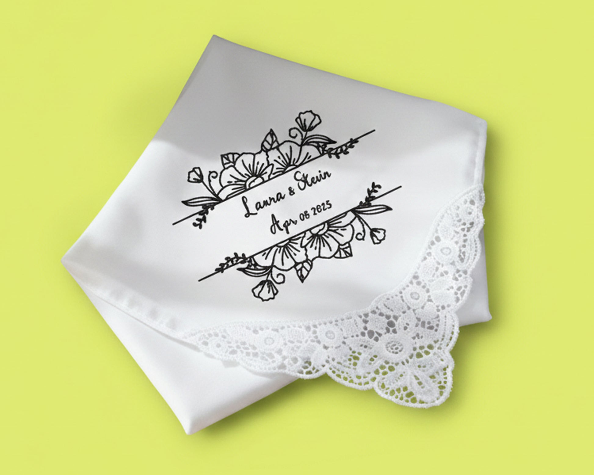 Premium white guest towel with a royal blue embroidered laurel wreath surrounding a personalized letter S monogram