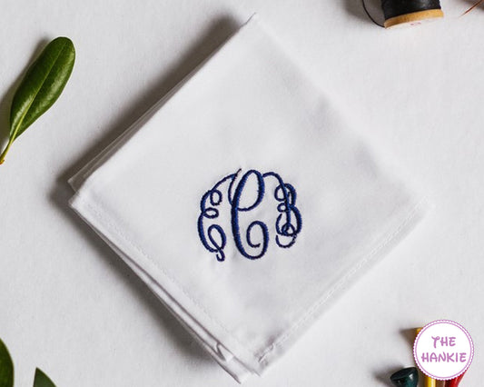 Personalized white handkerchief with blue circle monogram embroidery