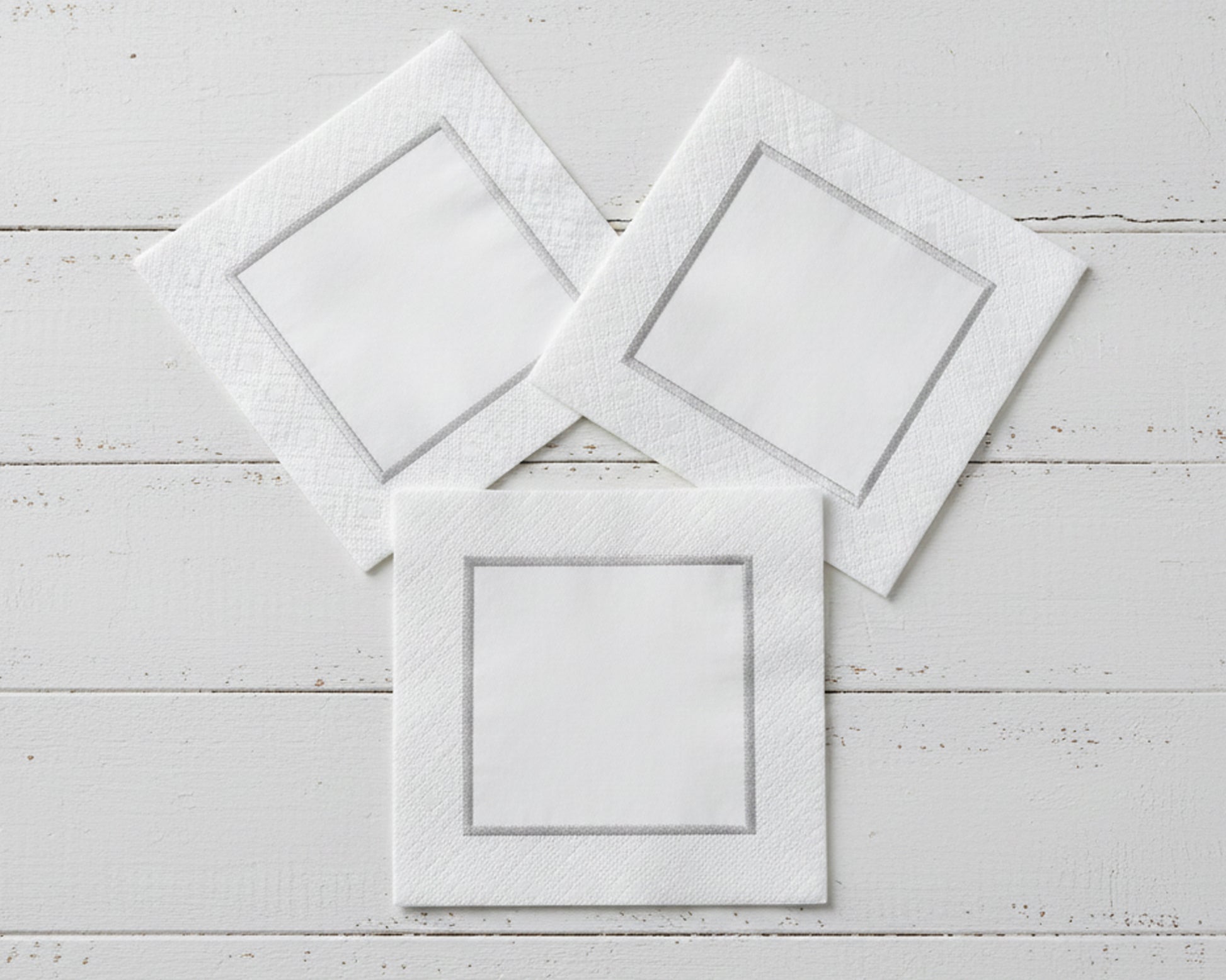 Traditional white hemstitch dinner napkin with a modern block-style monogram in high-quality thread