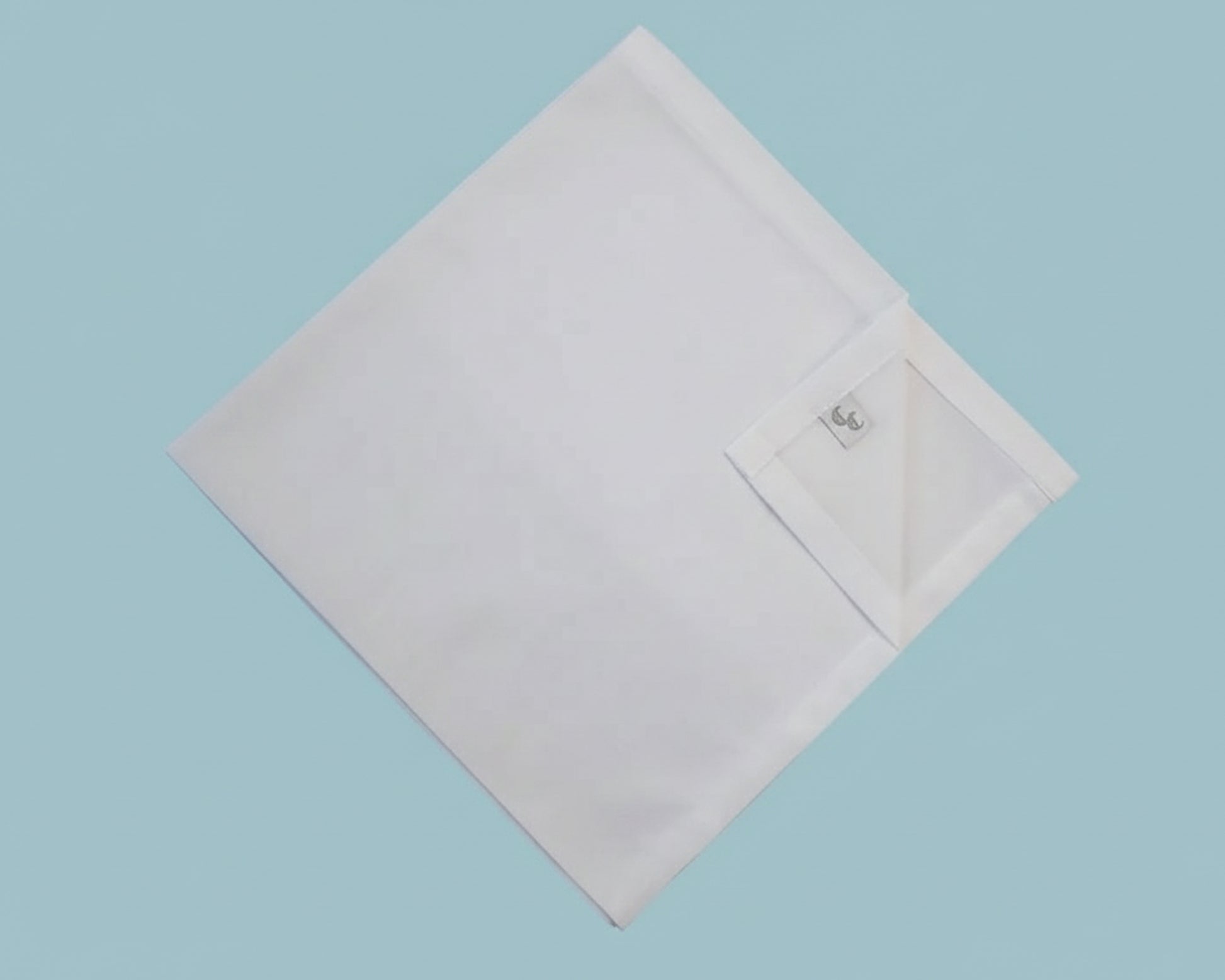 White handkerchief on a light blue background