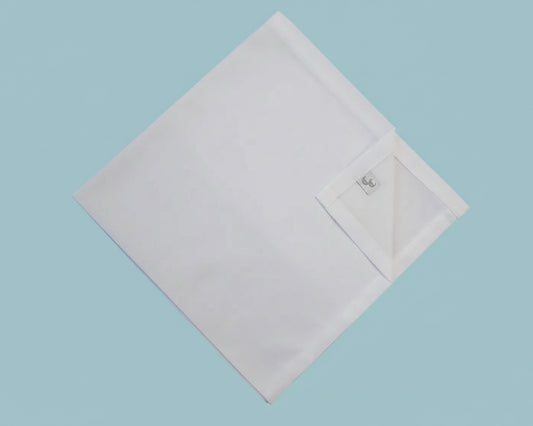 White handkerchief on a light blue background