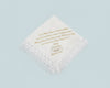 Matching set of large dinner and small cocktail napkins in white cotton with identical custom embroidery