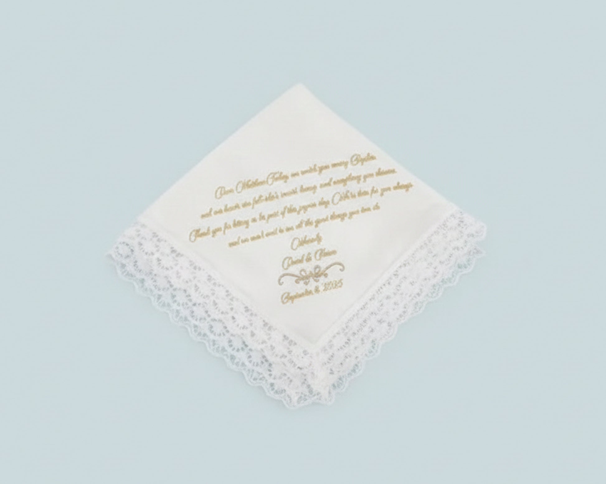 Matching set of large dinner and small cocktail napkins in white cotton with identical custom embroidery