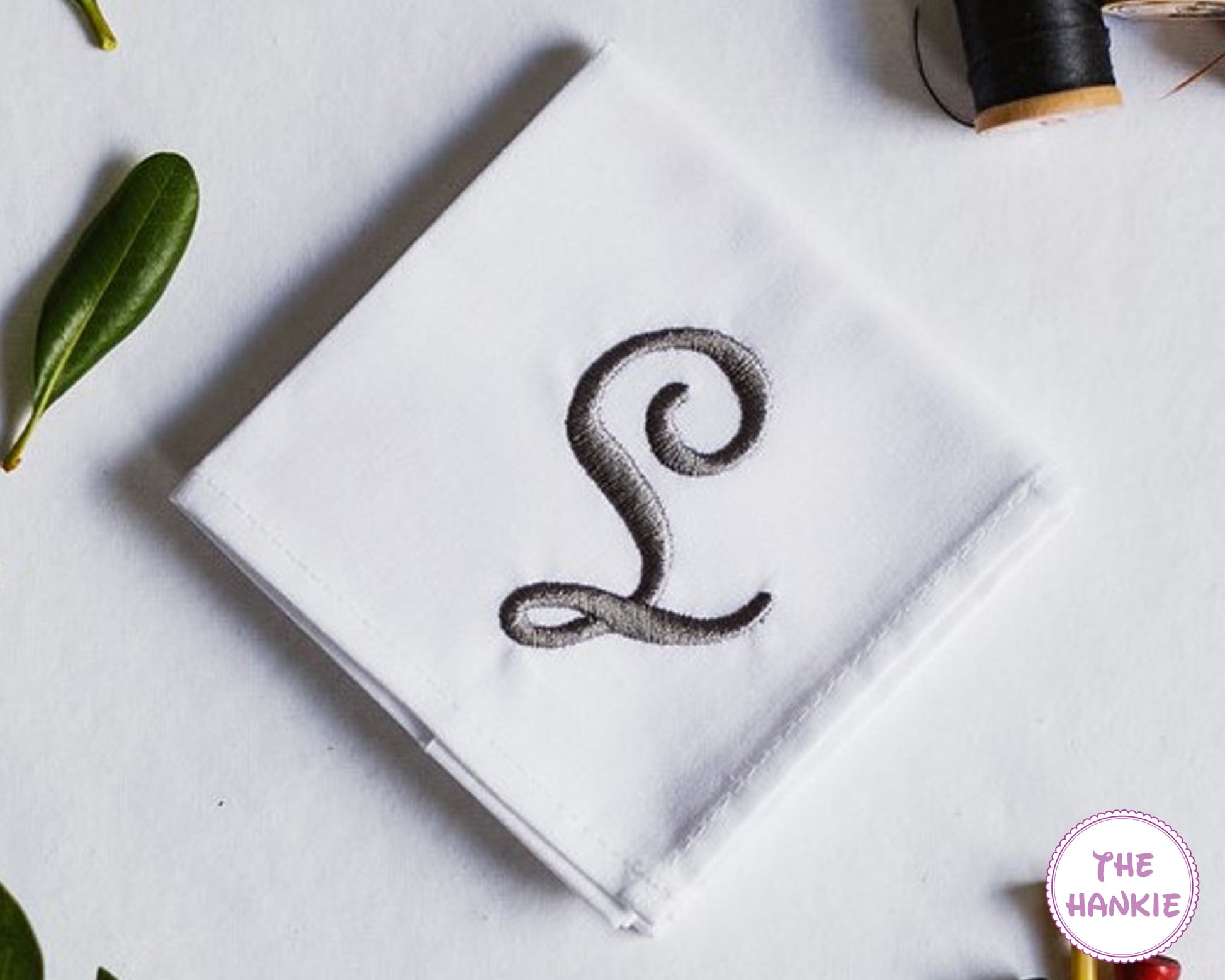 Custom white cotton handkerchief with elegant embroidered script initial monogram