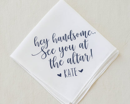 A white cotton bridal handkerchief featuring a detailed navy vinyl script message for the groom, signed "❤ KATE ❤".
