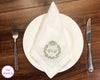Custom embroidered cotton handkerchief with green monogram wreath for wedding table decor