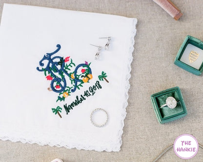 Custom embroidered wedding handkerchief with floral initials, name, and wedding date