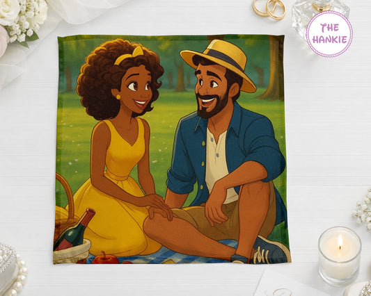 A personalized white handkerchief featuring a custom 3D storybook style illustration of a couple on a picnic.
