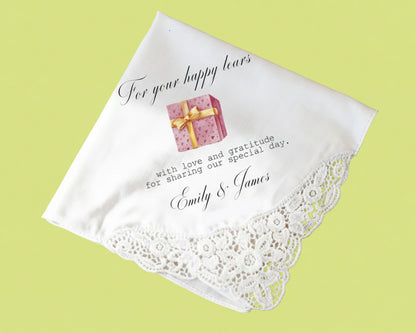 White dinner napkin with festive holly and  embroidery
