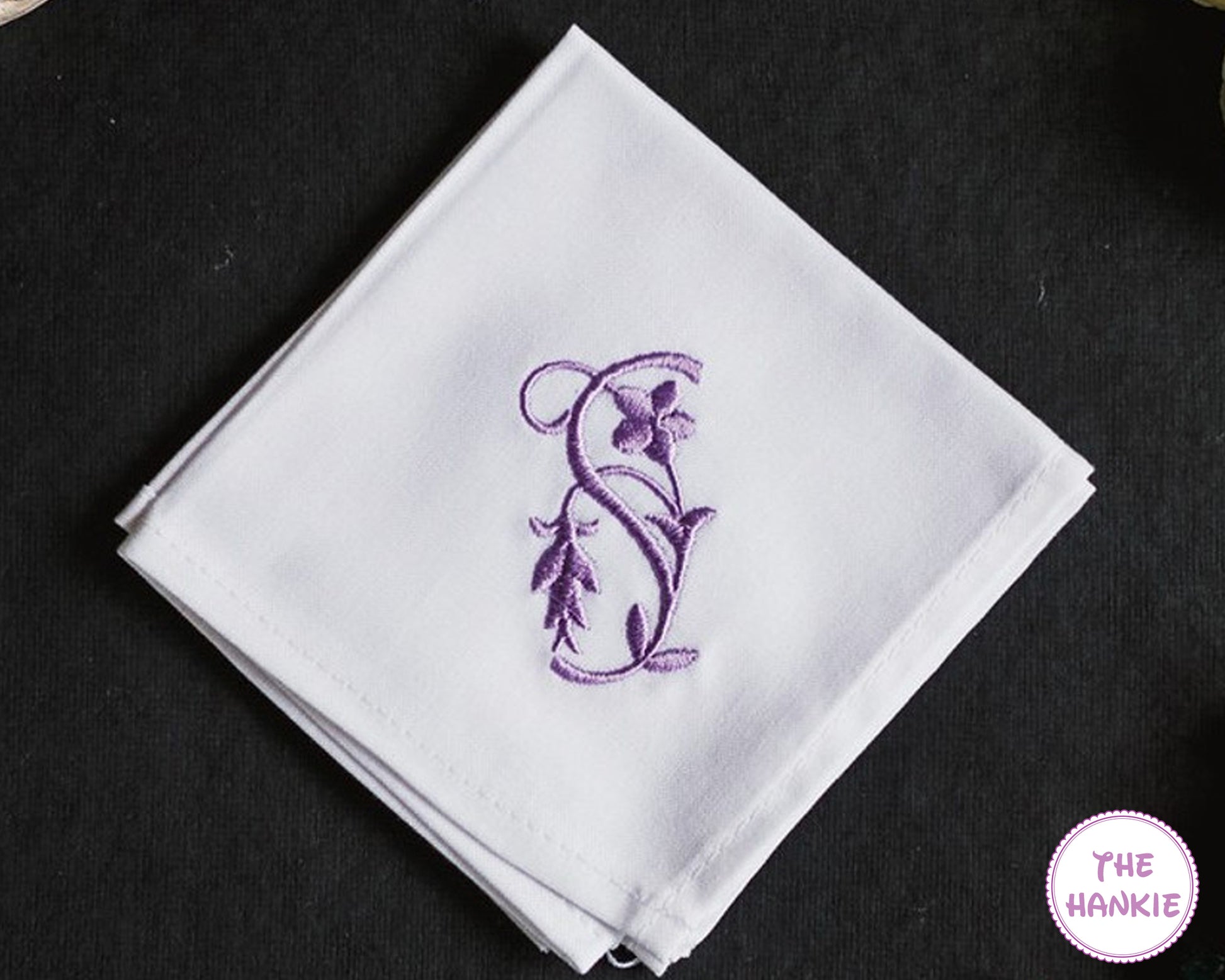 Personalized white handkerchief featuring elegant purple floral initial embroidery