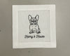 A single white 100% cotton hemstitch napkin featuring a detailed black machine-embroidered French Bulldog illustration and "Harry's House" artisanal script.
